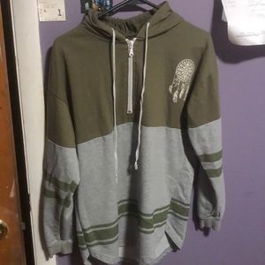 A dark camp kinda green and grey sweatshirt